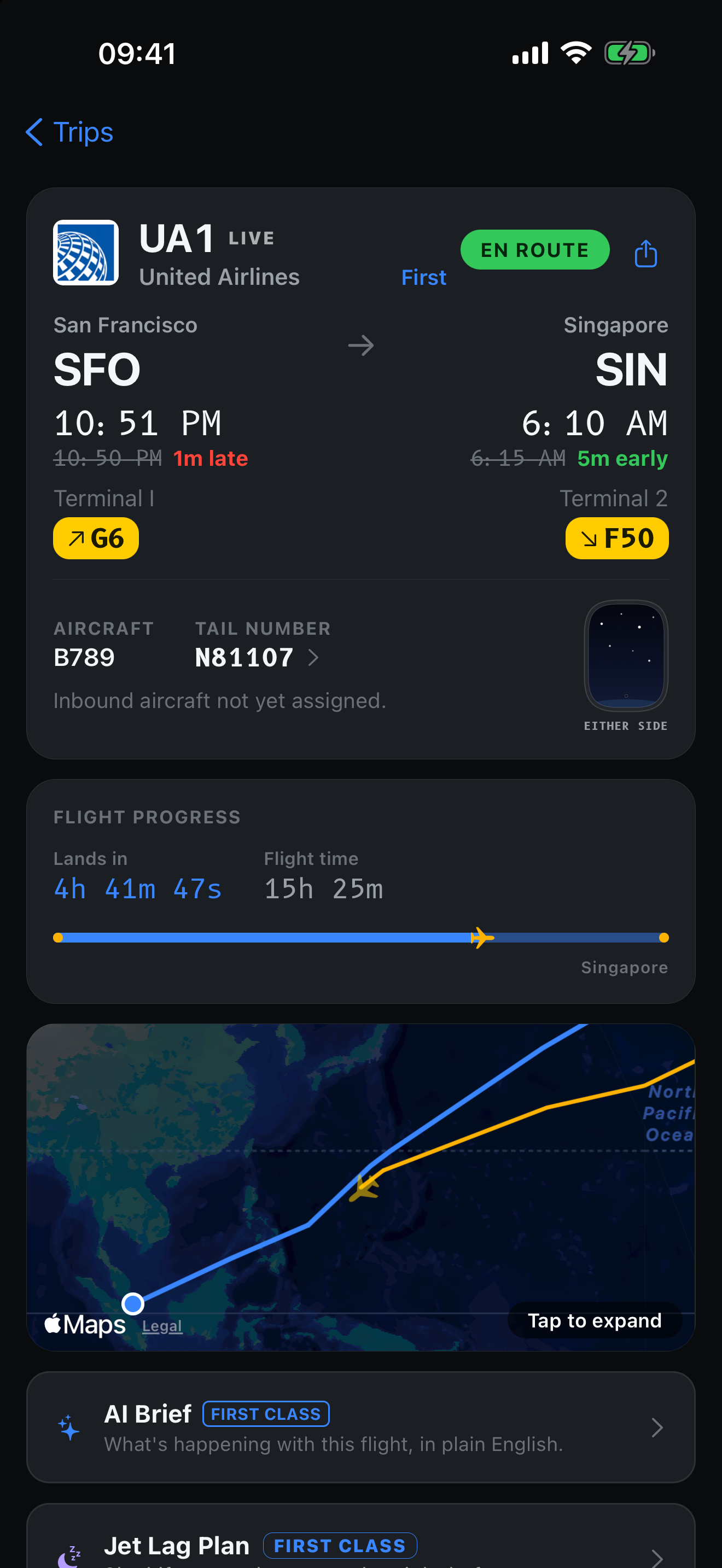 The same flight with the aircraft over the North Pacific, the filed route in blue and the flown track in amber.